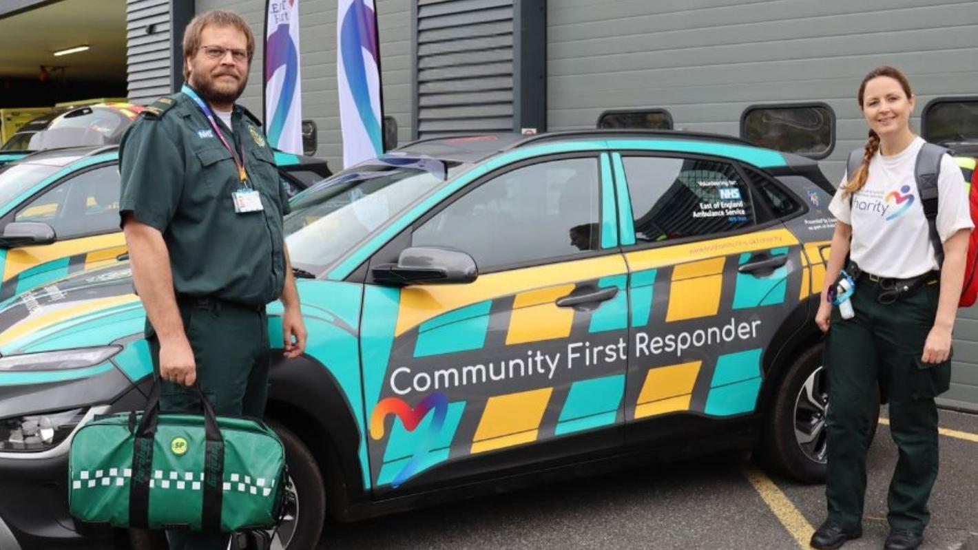 EEAST staff and volunteers standing in front of a community response car